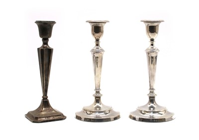 Lot 183 - A pair of silver candlesticks