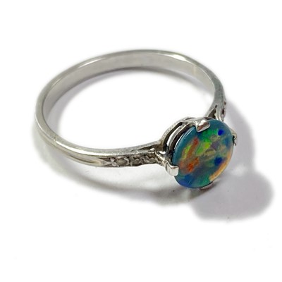 Lot 18 - A black opal and diamond ring