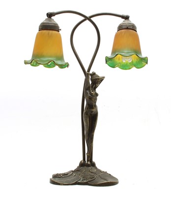 Lot 250 - An Art Nouveau style twin branch table lamp