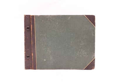 Lot 36 - A photograph album containing over 100 black and white photographs of trench warfare