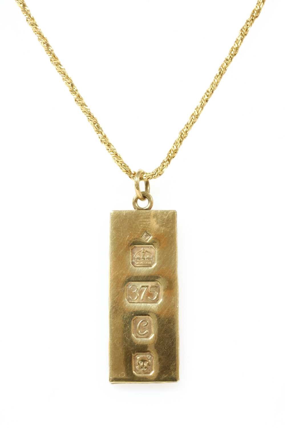 Lot 134 - A 9ct gold ingot pendant