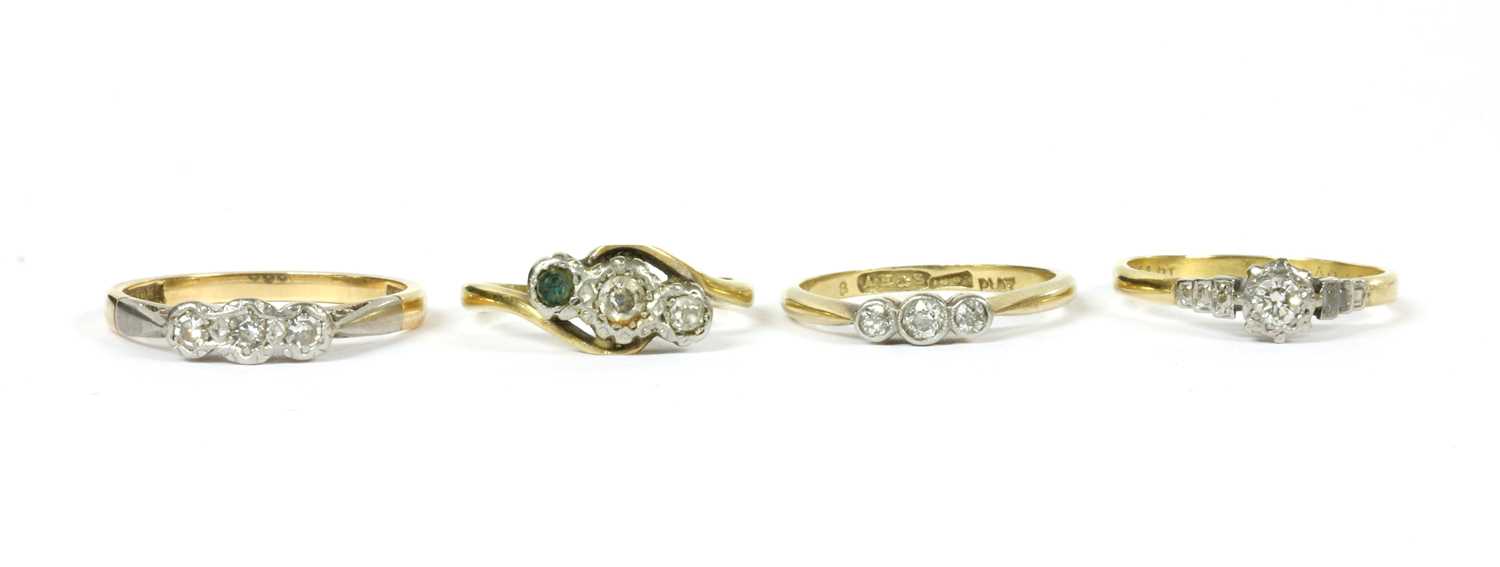 Lot 260 - A gold three stone diamond ring