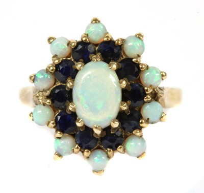 Lot 275 - A 9ct gold opal and sapphire cluster ring