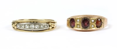 Lot 4 - A gold seven stone diamond ring