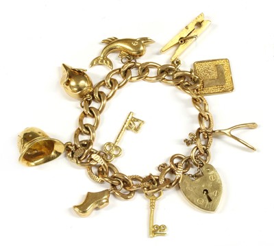 Lot 119 - A 9ct gold charm bracelet