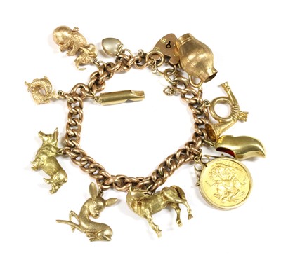 Lot 121 - A 9ct gold charm bracelet