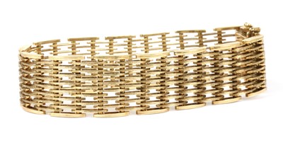 Lot 106 - A 9ct gold gate bracelet, c.1970