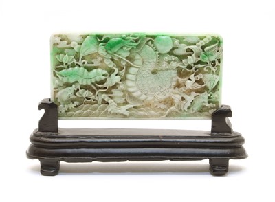Lot 211 - A Chinese green jade panel