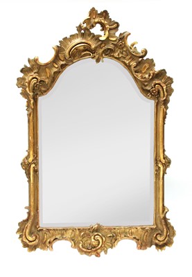 Lot 963 - A north European giltwood and gilt composition wall mirror
