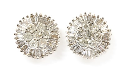 Lot 255 - A pair of gold diamond cluster earrings