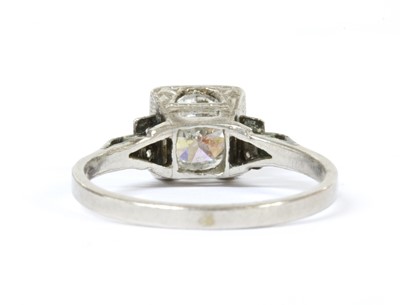 Lot 222 - An Art Deco style platinum diamond ring