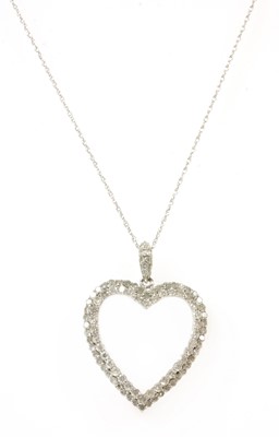 Lot 253 - A white gold diamond heart pendant