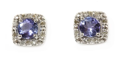 Lot 294 - A pair of white gold tanzanite and diamond stud earrings