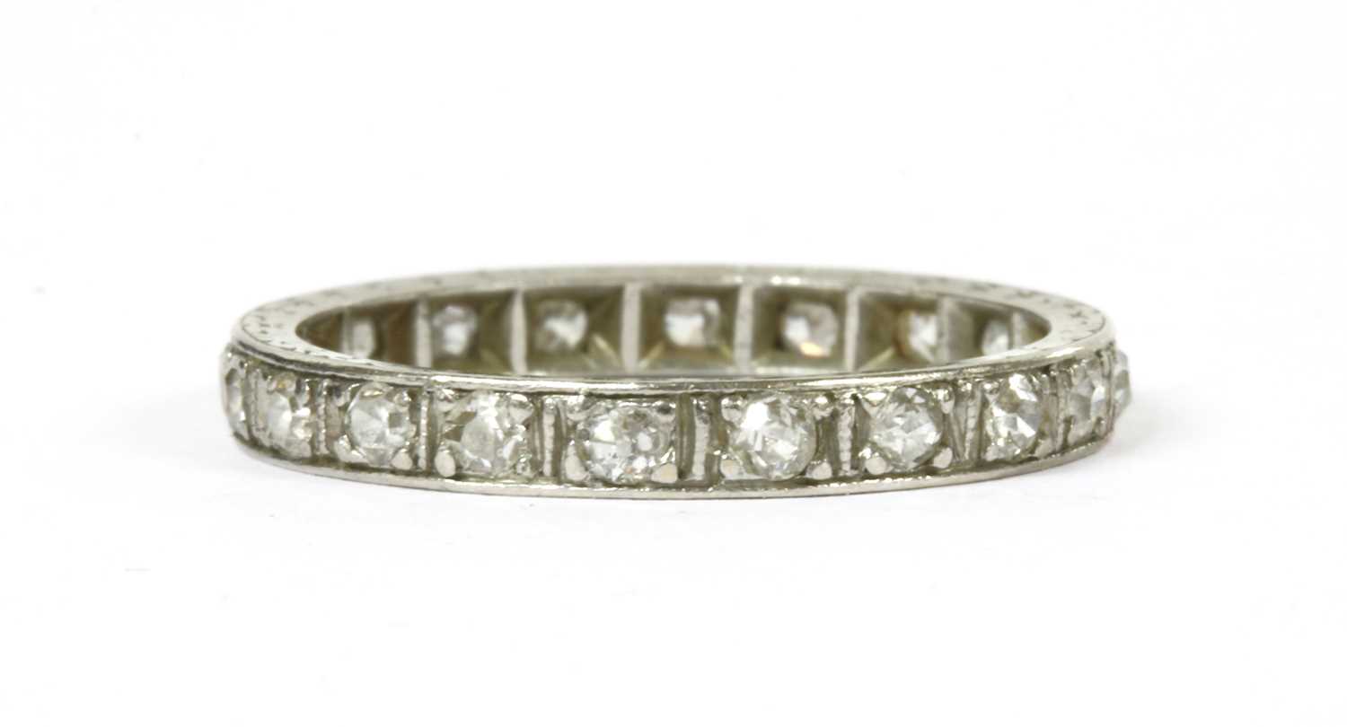 Lot 62 - A diamond full eternity ring