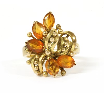 Lot 300 - A gold citrine cluster ring