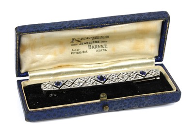 Lot 31 - An Art Deco sapphire and diamond plaque brooch, c.1920