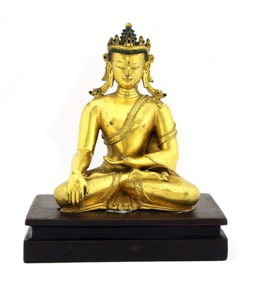 Lot 214 - A Chinese gilt-bronze Shakyamuni Buddha
