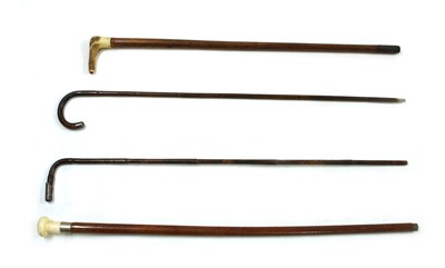 Lot 389 - A collection of walking sticks