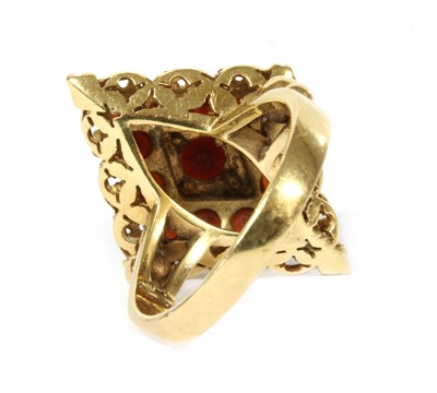 Lot 281 - A gold garnet ring