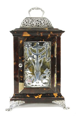 Lot 57 - A cast silver and tortoiseshell carriage clock