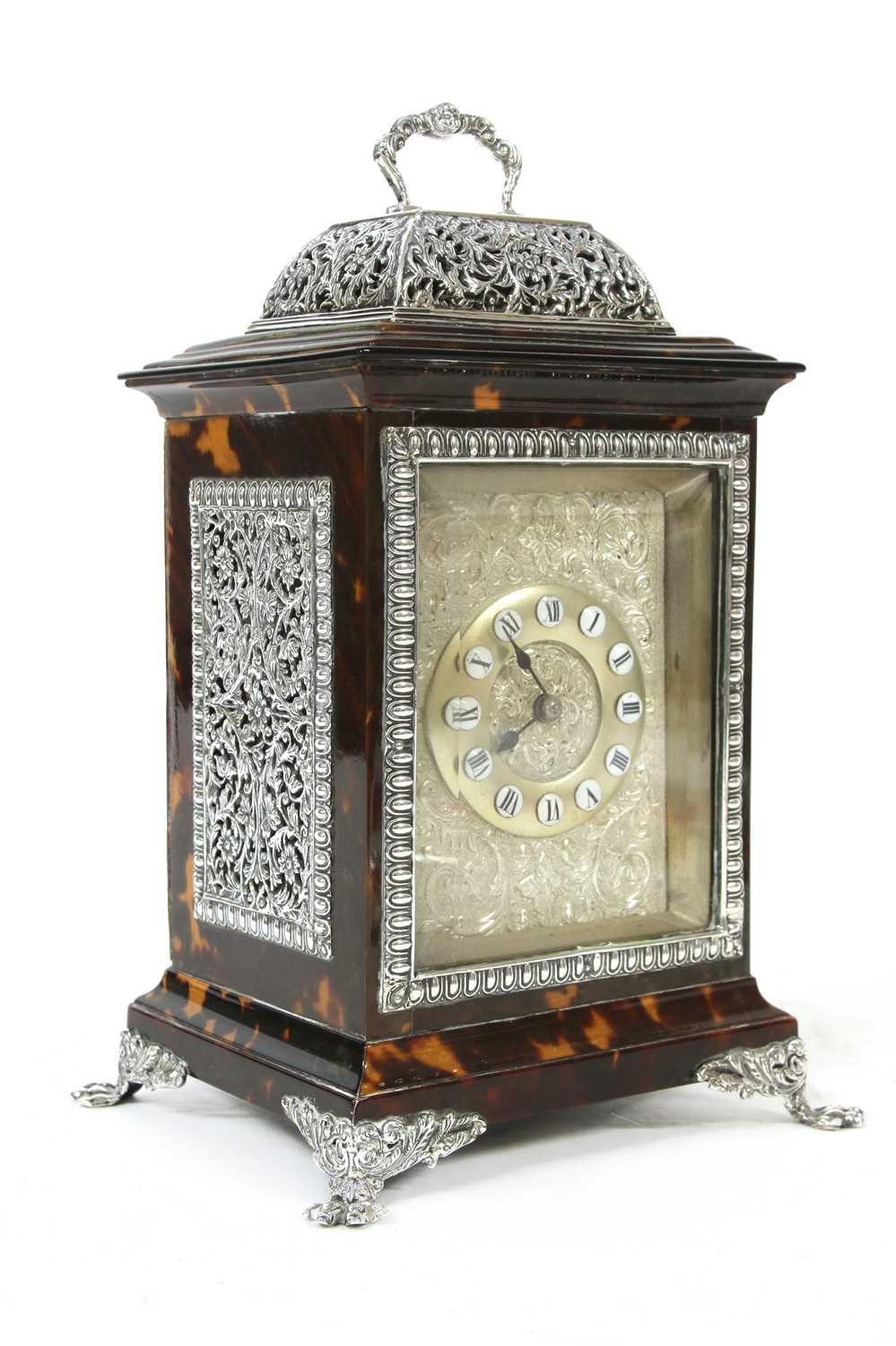 Lot 57 - A cast silver and tortoiseshell carriage clock