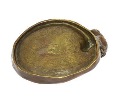 Lot 223 - A bronze pin dish