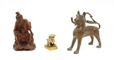 Lot 227 - An Eastern lion aquamanile type table lighter
