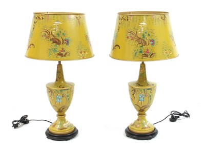 Lot 830 - A pair of yellow toleware-style table lamps and shades