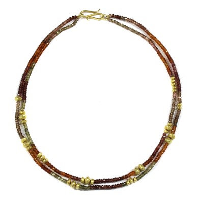 Lot 230 - A two row gold and assorted gemstone bead necklace