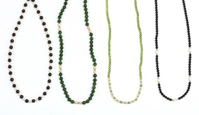 Lot 379 - A gold nephrite jade and cultured freshwater pearl necklace