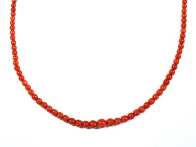 Lot 211 - A single row graduated coral bead necklace