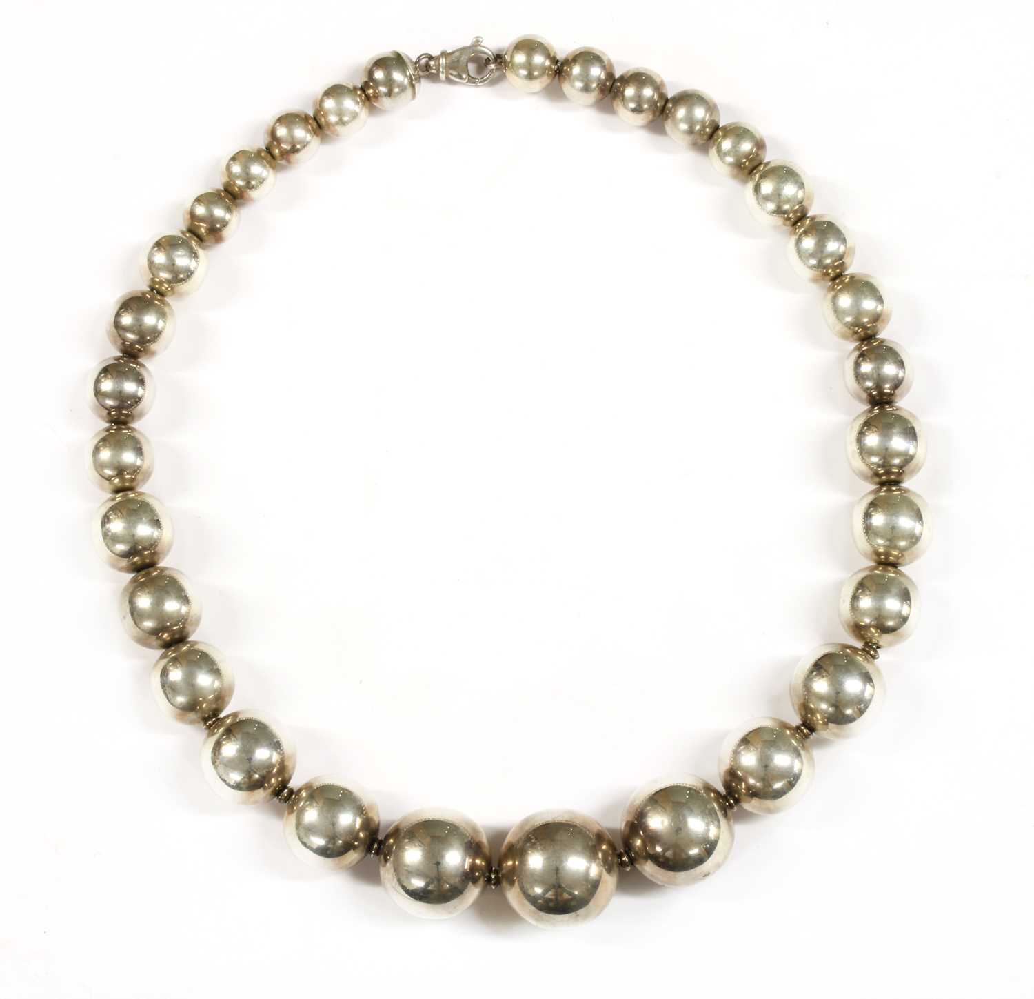Lot 81 - An Italian sterling silver single row graduated bead necklace, by Old Florence