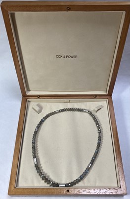 Lot 220 - A white gold labradorite bead necklace by Cox & Power