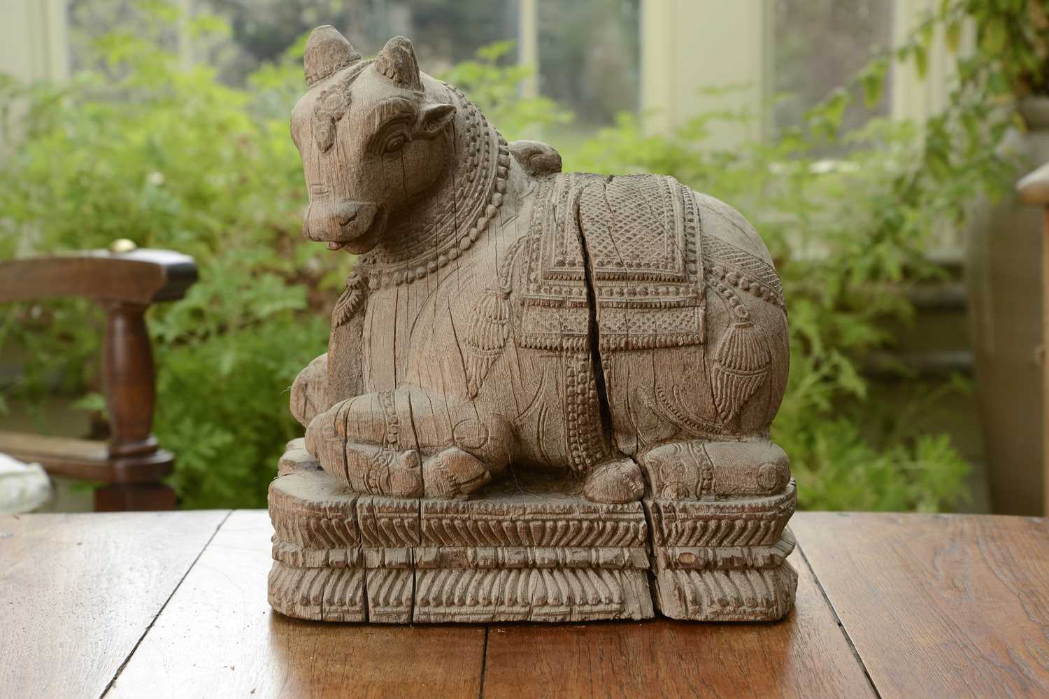 Lot 14 - A carved teak figure of the Nandi Bull