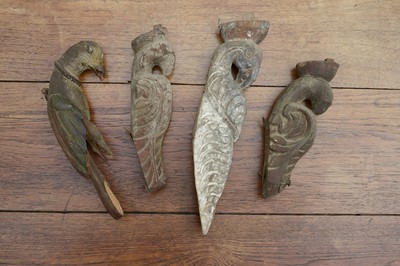 Lot 17 - Four carved wooden figures of birds