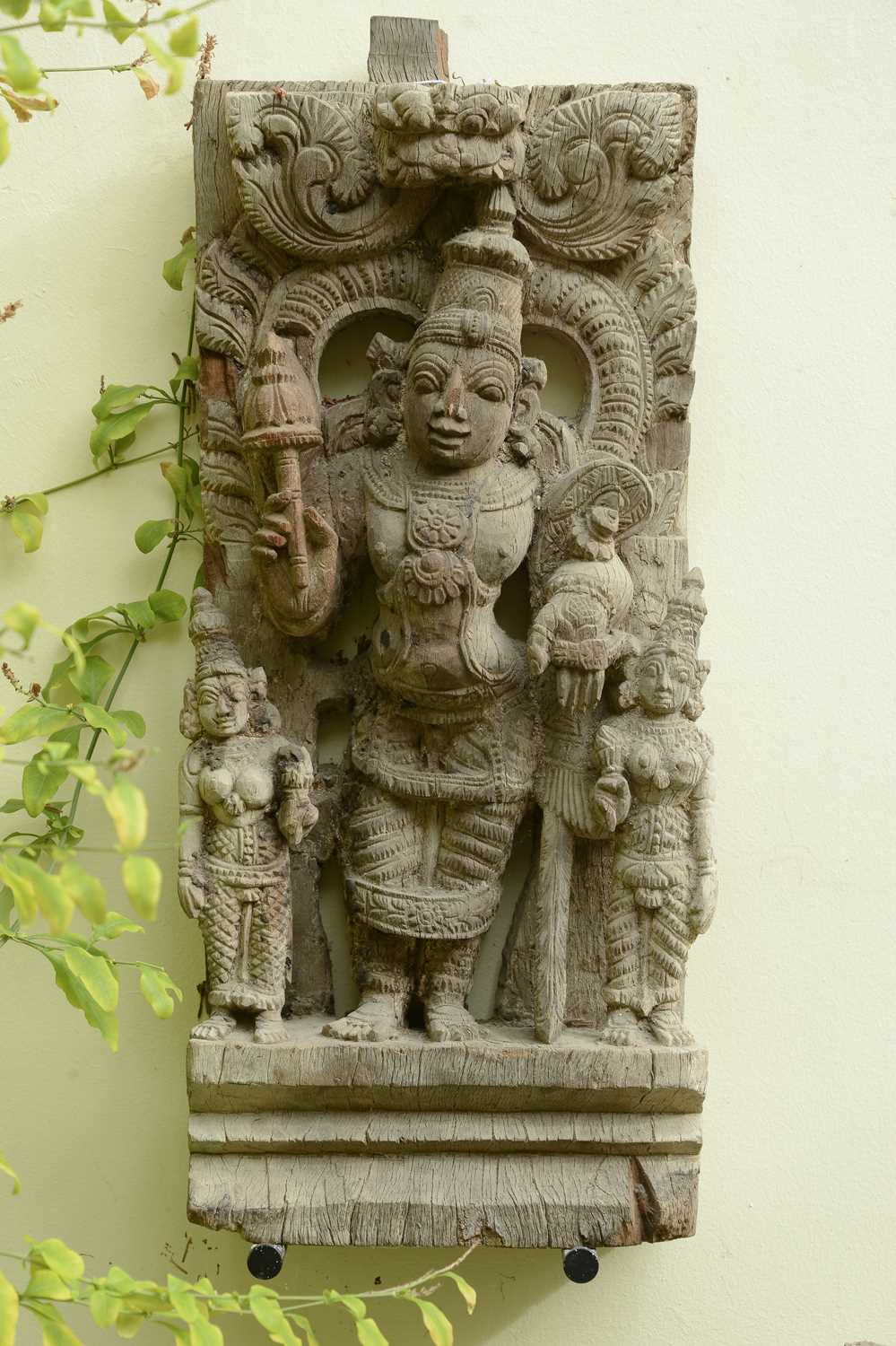Lot 10 - A hardwood carved panel of Vishnu