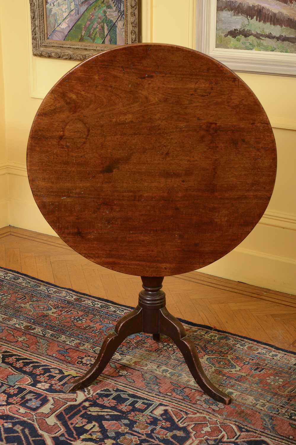 Lot 97 - A George III mahogany tilt-top supper table