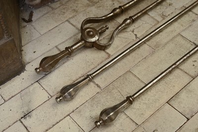 Lot 119 - A set of three George III steel fire irons