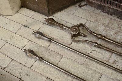 Lot 119 - A set of three George III steel fire irons