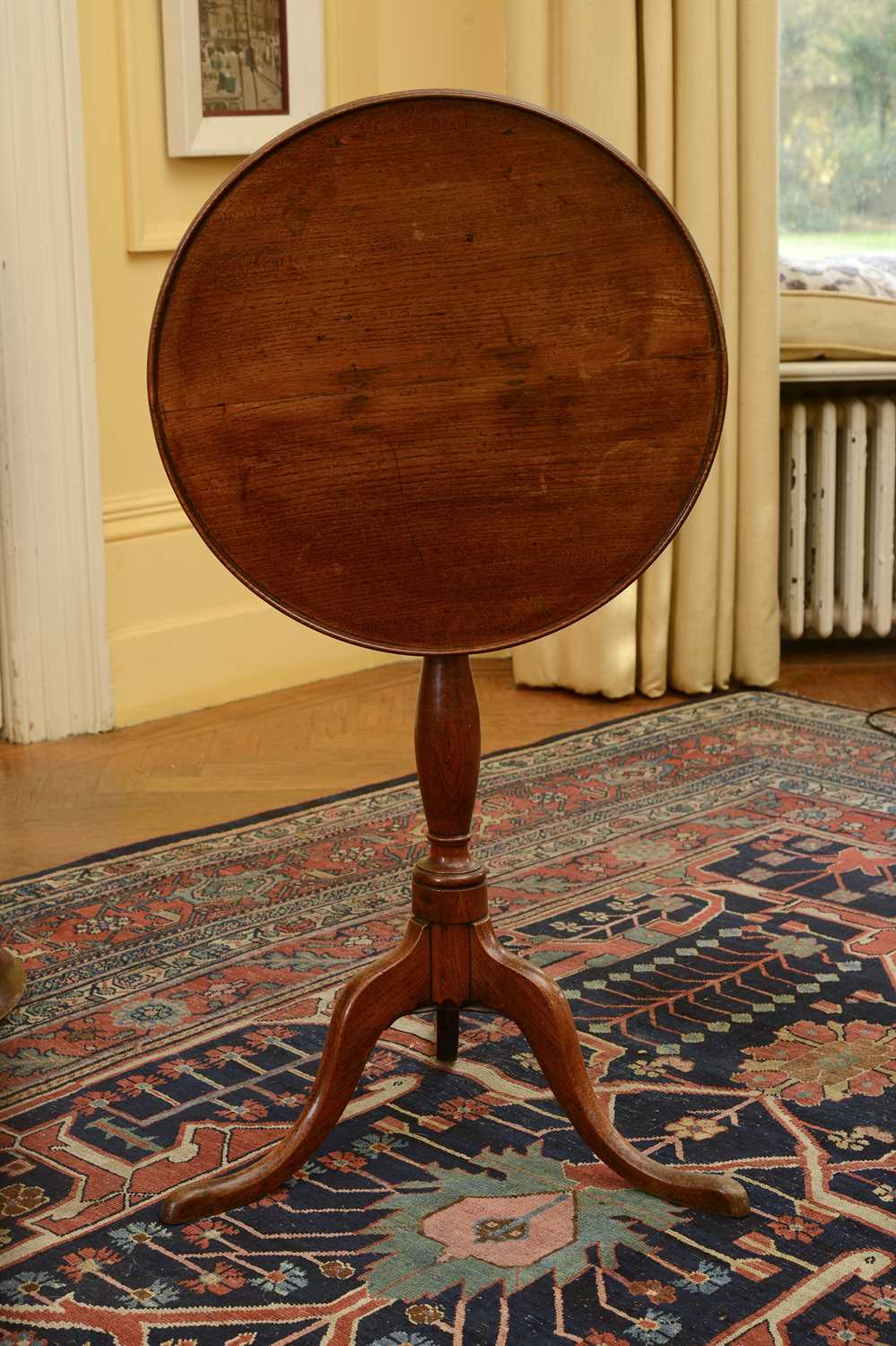 Lot 122 - A George III oak occasional table