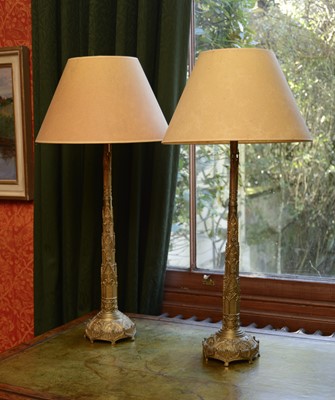 Lot 195 - A pair of Gothic Revival brass table lamps