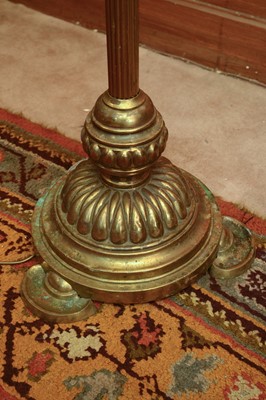 Lot 205 - A brass standard lamp