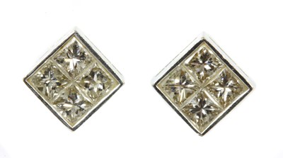 Lot 65 - A pair of white gold diamond earrings