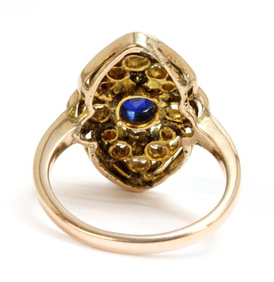 Lot 116 - A gold sapphire and diamond cluster ring