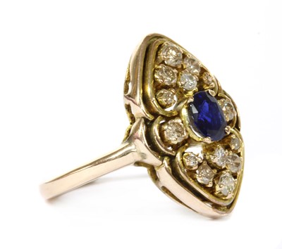 Lot 116 - A gold sapphire and diamond cluster ring