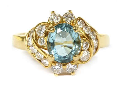 Lot 128 - An aquamarine and diamond cluster ring