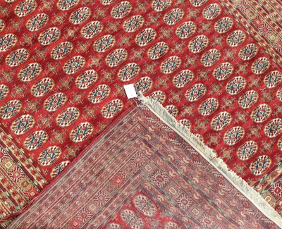 Lot 485 - An Afghan carpet of Bokhara design