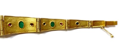 Lot 188 - A gold emerald, sapphire and ruby bracelet