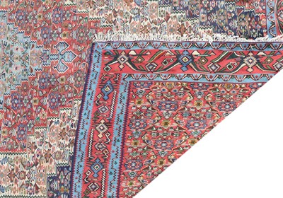 Lot 394 - A Persian Senneh kilim