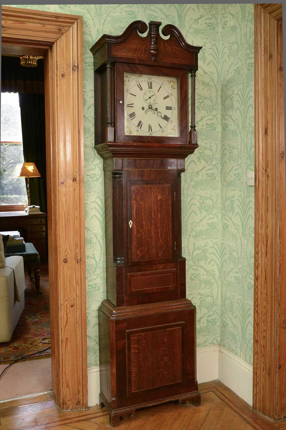 Lot 26 - An oak and mahogany longcase clock